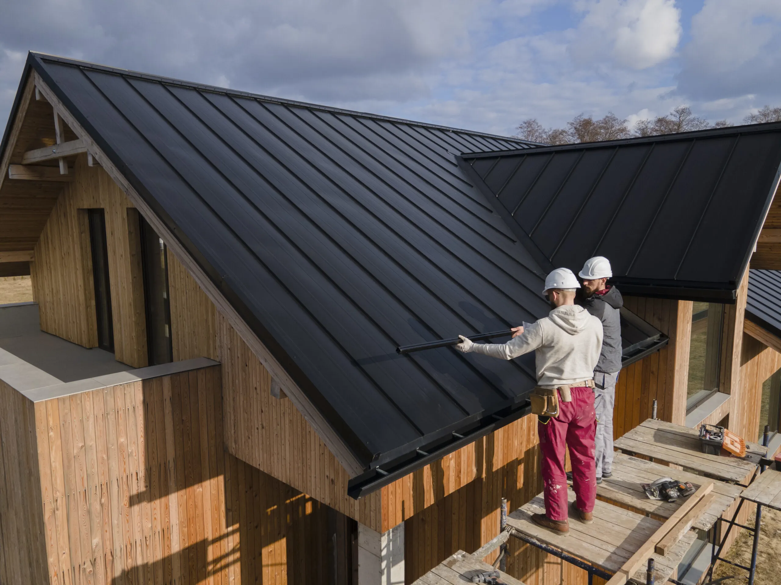 Rainstone Roofing crew working on a DFW roof